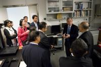 Prof. Chan Wai-yee guides our guest to tour the core facilities of School of Biomedical Sciences